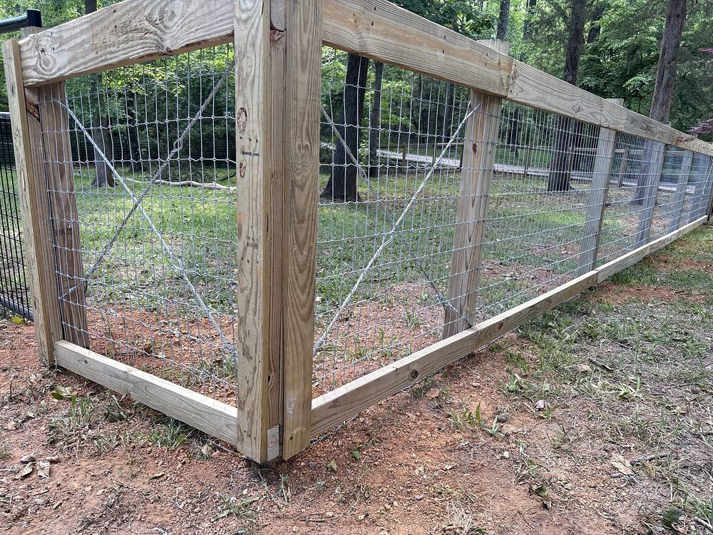 Braced corner of a wood and wire farm fence in the Midlands of South Carolina